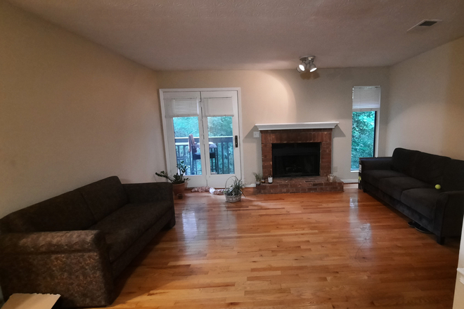 Living room - 1 Bedroom with private bath available in 2 Bedroom/2 Bath roommate plan condo, female roommate