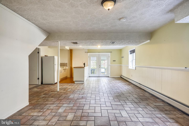 Open Living Dining & Kitchen - Newly Updated Lower Level Apartment (South Campus)