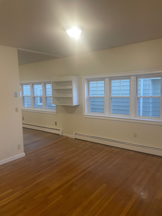 living room - 3 bedroom near Tufts. Brand new kitchen and bath. Available May 15th (flexible). No broker fees.