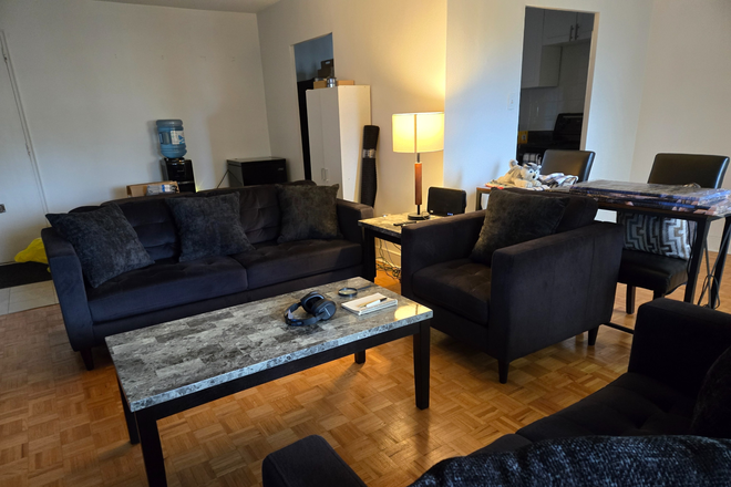 Living room - Furnished bedroom in 2 bedroom apartment located in Etobicoke. Close to Kiplin