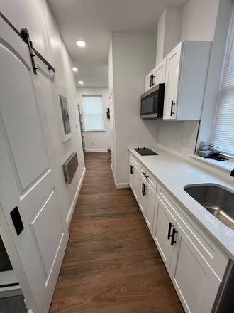 Kitchen - Newly Renovated, Fully Furnished Studio - Includes Wi-Fi Apartments