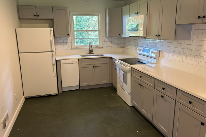 Renovated kitchen with new appliances - 2-bed, 1-bath Avondale Estates Apartment
