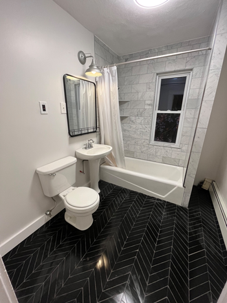 Bathroom - No Broker’s Fee!! Updated Apartment. Free parking. Granite/stainless kitchen.