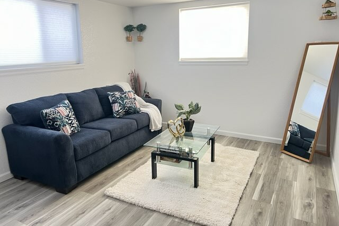 Living room - “Spacious 4BR Home Near Anschutz with Huge Yard & Trail Access”