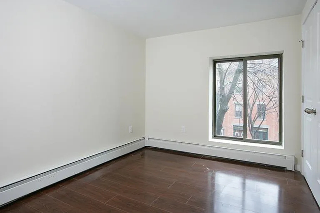 Bedroom - 16 E Springfield St #4, less than a mile from campus