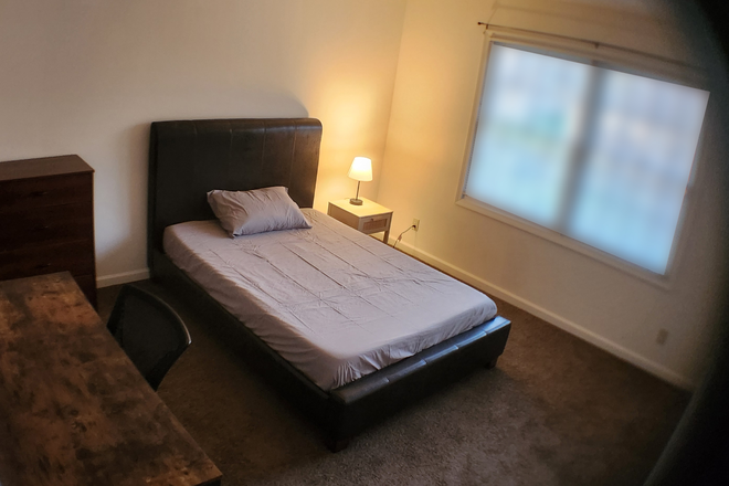 bedroom 1 - Partially Furnished Room w/ Study, Private Bath; ALL utilities included Duplex
