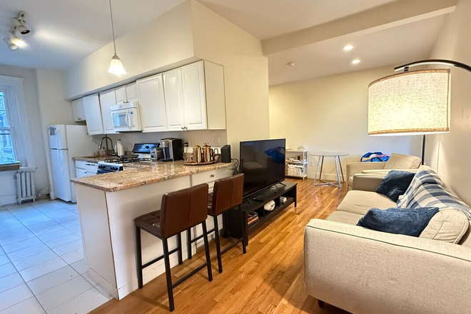 Visit hubrealtyproperties.com - Bright two bedroom, next to BC shuttle stop, good for 3