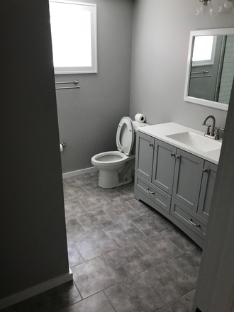 Bath with walk in shower - Franklin Hall Apartments