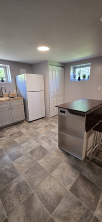 Kitchen and laundry - Basement Apartment