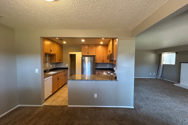 Kitchen from dinning area - Spacious 2 Bedroom, 2 Bathroom Condo