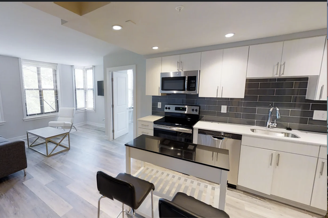 Kitchen & Living Room - Spacious 2 BR corner unit next to campus Haven/Varsity on K