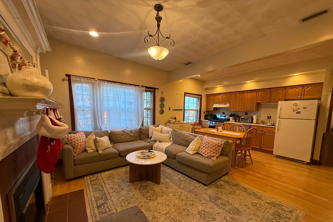 Living area and Kitchen - HUGE 4-BEDROOM 2-BATH APARTMENT - DIRECTLY ACROSS FROM NEU CAMPUS