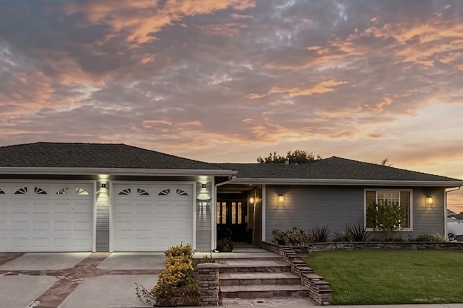 large front yard with three car garage, plenty of driveway and street parking - 4 Bedroom Home Completely Updated- 7 mins. to Rinker campus