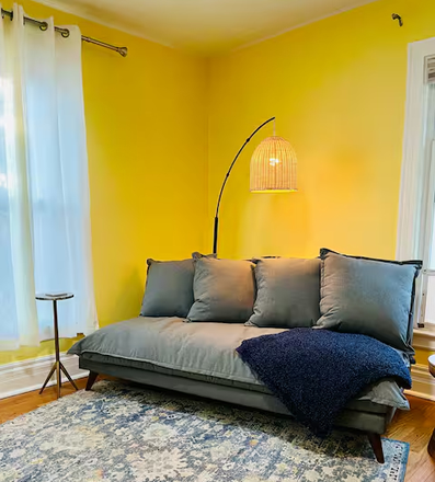 Living room - Sunny Furnished 2BR/1BA downtown Ypsi, $2,250 inc. utilities, 20-30 min to U-M Central, Dogs OK!