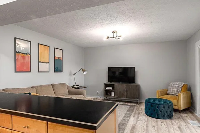 Living Room - House-Like Condo Close to Campus