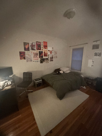 This is my bedroom. It has two closets and an A/C unit - 61 Hillside St. Unit 3