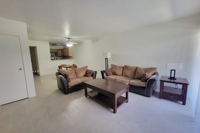 Living room - Furnished Campus Walk Condo — Walk to UArizona