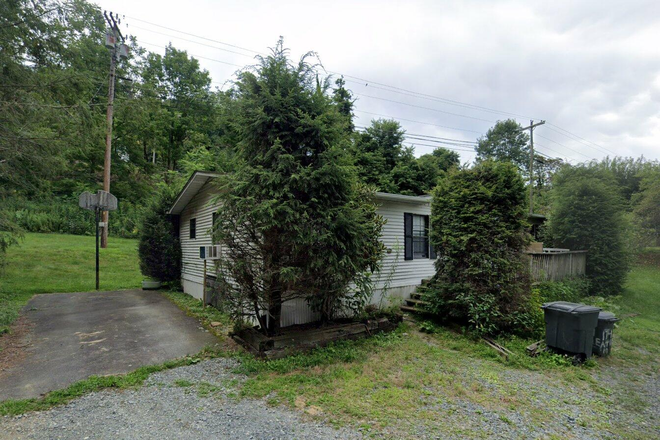 Street view of front of the house. - House 6 minutes from campus (large yard and parking!)