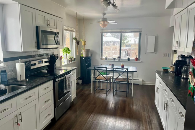 eat-in kitchen - Spacious, updated 3 bd 2 bath home, utilities included