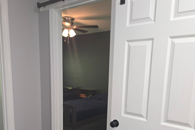 Bedroom 1 door - Quiet, Study-Oriented Room in North Charleston Gated Community Townhome