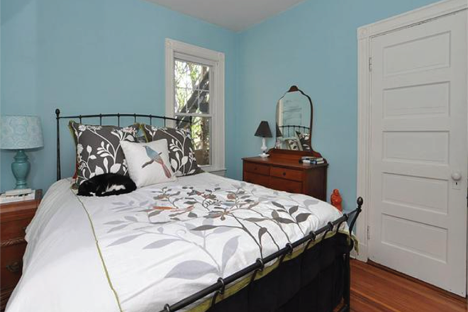 Bedroom - This room does also have a closet, door pictured. This room can accommodate a full bed, dresser, and decent sized desk. - 201 E Cottage Street Apt 3