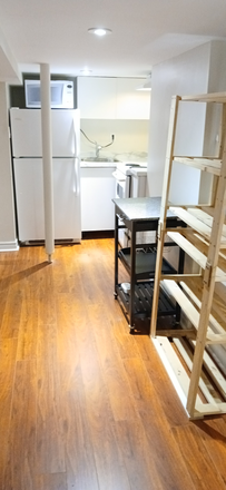 Kitchen and hallway - Only $850 – Fully Furnished Student Oasis (Main St Subway/GO) All utilities/bell fibe wifi included