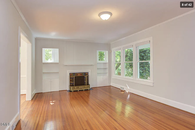 1st Floor Living Room 1 with Fireplace - Walk to Campus from a Nice Single Family Home