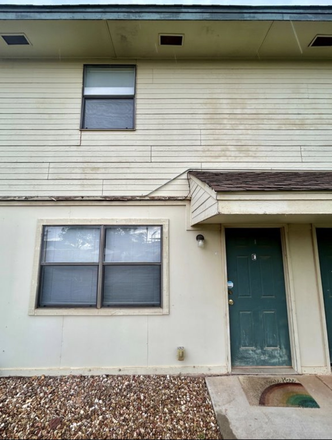 Front of unit - Duplex-walking distance to campus!
