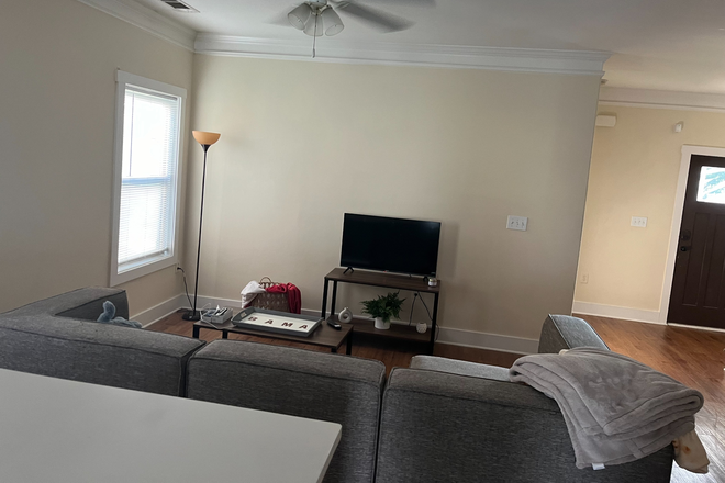 Living Room (TV not included) - The Cottages Apartments