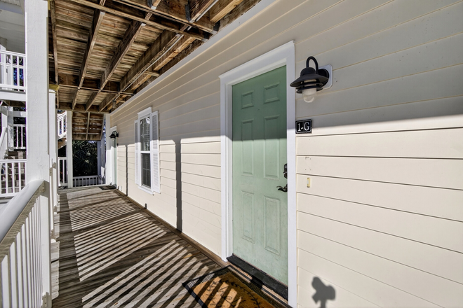 Front walkway - 2 bed/2 bath, large balcony, marsh views, water included Condo