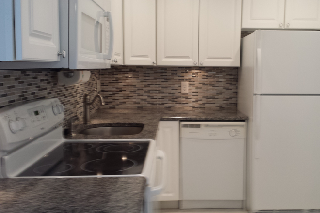 Kitchen - Top-Floor Corner 2/2 Apartment Steps from FAU, Shopping, Beaches, & More