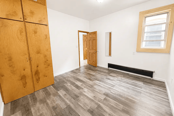 Bedroom with closet and mirror. - Private Master Bedroom in a 4 Bed 2 Bath Apt