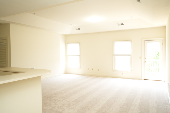 Living Room - Old Trail Village- Two Bedroom Apartments Available!