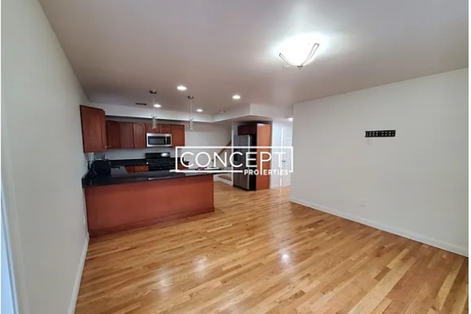 Kitchen and living room - Roommates Needed – 57 Circuit St, Boston | 2 Spots Open, Steps to Campus