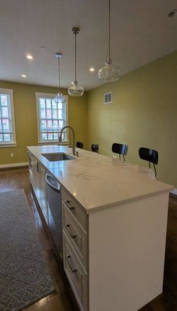 Huge kitchen island, perfect for dinner parties and hanging out - Live near your work AND your play! Walkable to Fells and Johns Hopkins House
