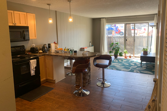 living space - Furnished 2 Story Condo next to CU Underpass/Bus Stop