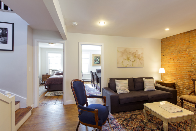 Living Area - LAUNDRY IN UNIT! Steps from Campus is this 4Bed/2Bath Sunlit Haven!