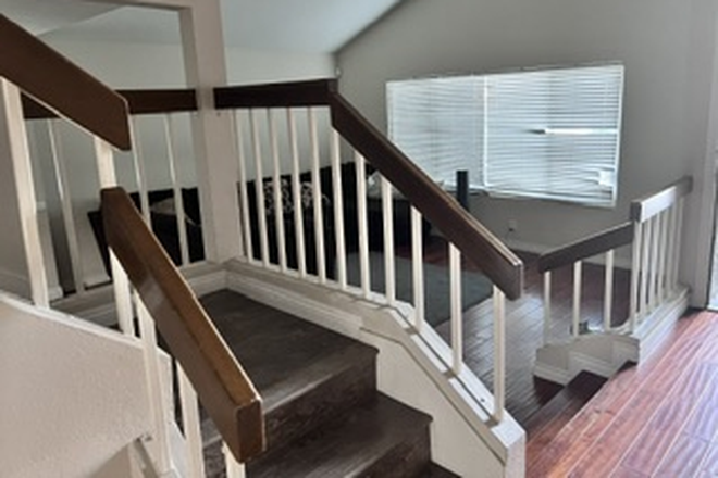 Staircase - Walk-to-Campus and Dodge College 5 bedroom Pool Home