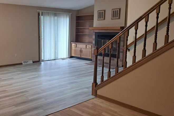 Looking east main floor, fireplace and built ins - 3 Bedroom Townhouse