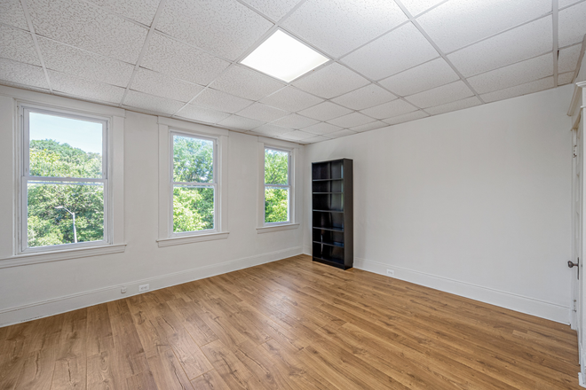 BedroomLiving Room - 111 West 29th Street, Baltimore, MD. Unit 3F. Apartments