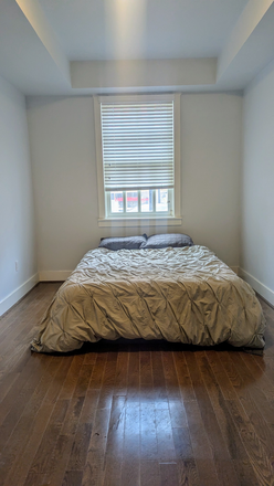 First floor bedroom with South facing windows - Live near your work AND your play! Walkable to Fells and Johns Hopkins House