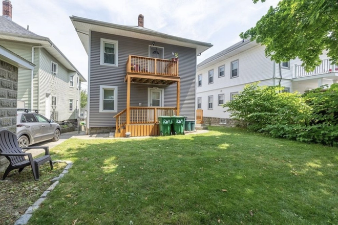 Back yard - $4,000 / 4BR – Spacious 2nd Floor Apt Near Tufts | Walk to Green Line, Whole Foods & Stop & Sh