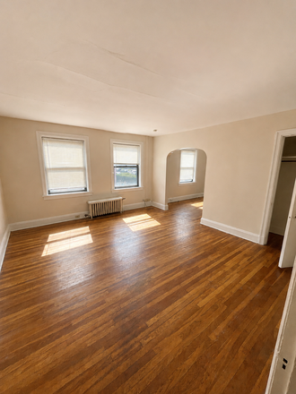 Living Room to Dining Room - Hobart Wightman Apartments