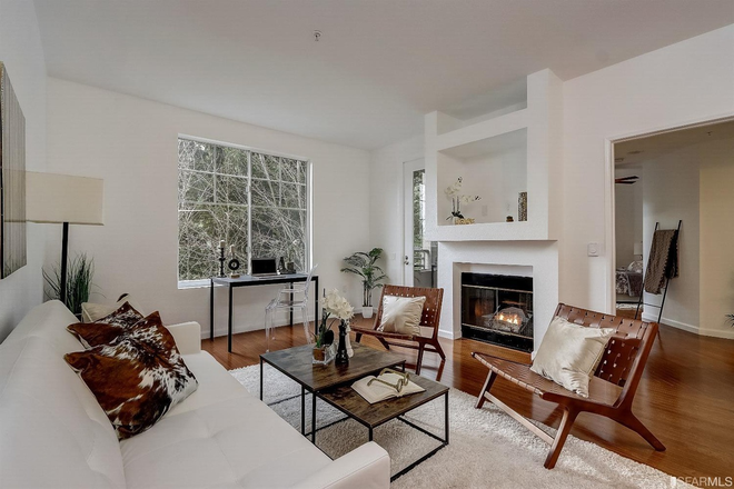 Living Room - Experience Resort-Style Living in This Gated Community Modern Condo Close to UC Berkeley