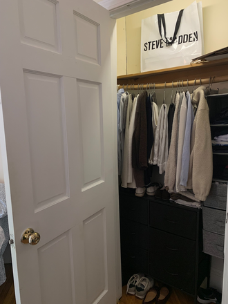 Big closet with hangers and drawers to store more clothes. - 5 bedroom 2 bathroom apartment