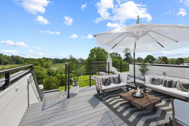 Rooftop deck - 2024-built 4BR + den/3.5BA Townhome w/ Rooftop Deck and golf course views – 7-Min Walk to metro