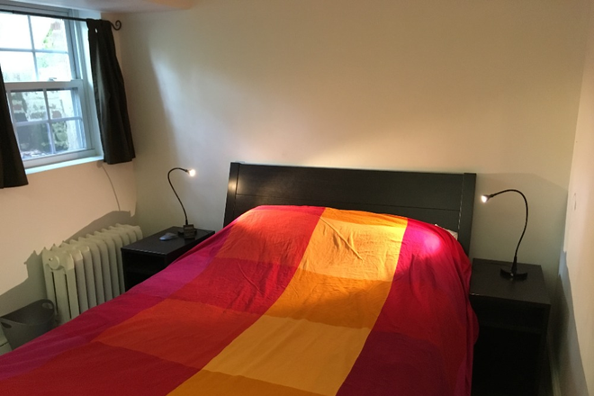 First bedroom - Two-bedroom basement apartment w/ private entrance