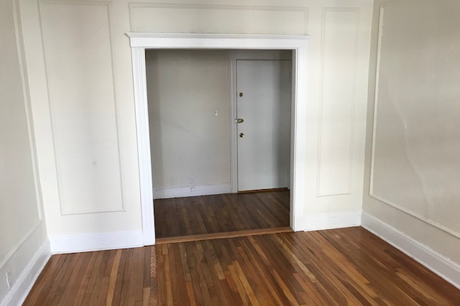 Hub Realty - Bright one bedroom with deck, near Washington St T stop Apartments