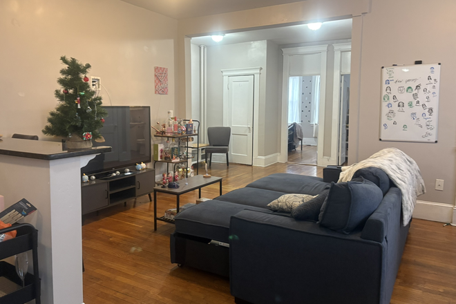 living room - NO FEE!!! BIGGEST apartments near AGGANIS ARENA, SPACIOUS Bedrooms, SECONDS FROM CAMPUS