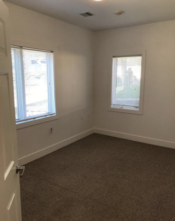 Bedroom (from entrance) - The Flats Condo